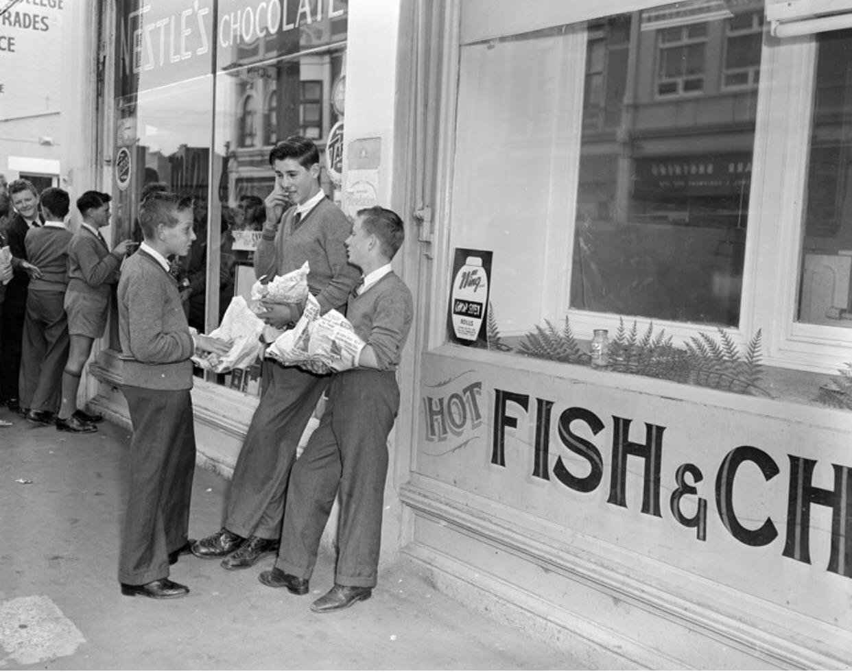 Kew schoolboys outside fish and chips shop. 1959. Photo Source – Museum Victoria